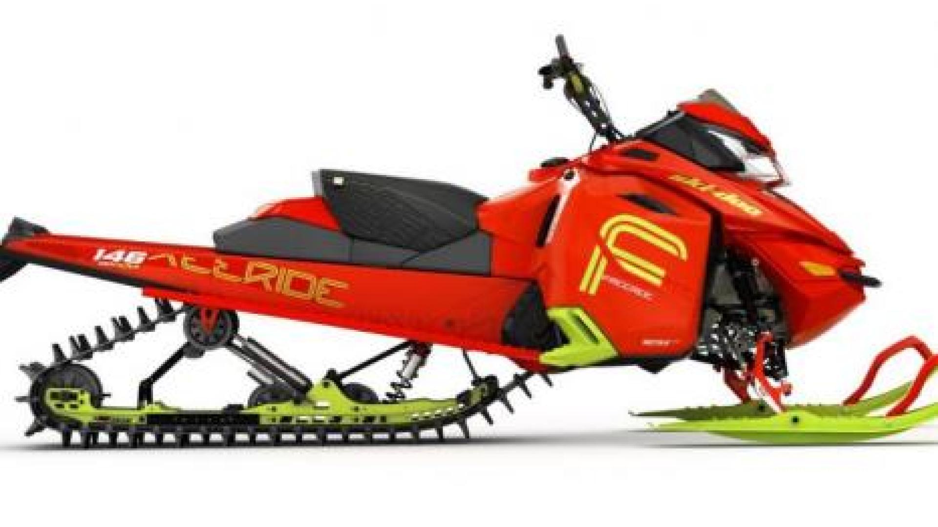 Side view of a red snowmobile.