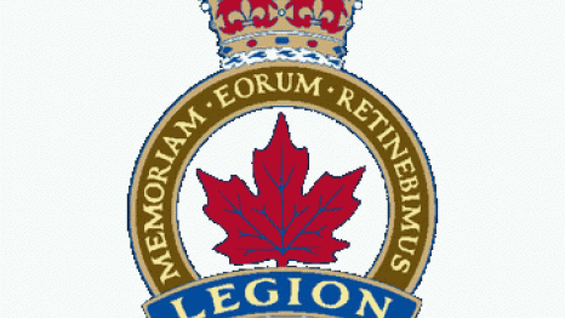 Royal Canadian Legion shield. The shield has a crown on top, red poppy flowers in the bottom and a red maple leaf in the center.