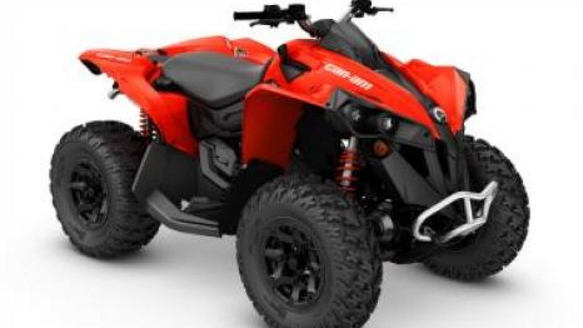 Side view of a rad and black ATV.