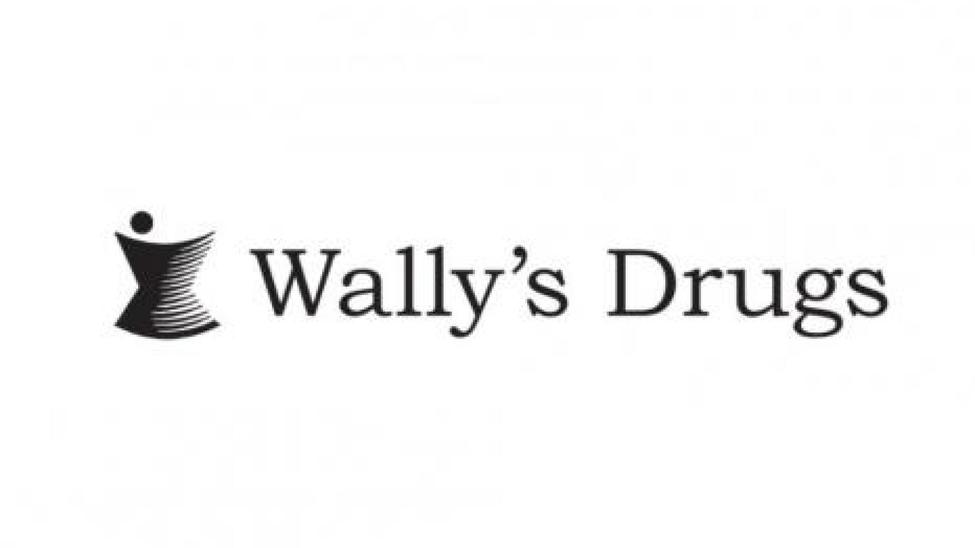 Signage for Wally's Drugstore.