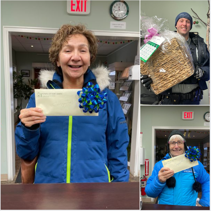 Shop Local Bingo winners holding their prizes